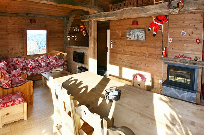 The dining room and the sitting room seen from the bay windows